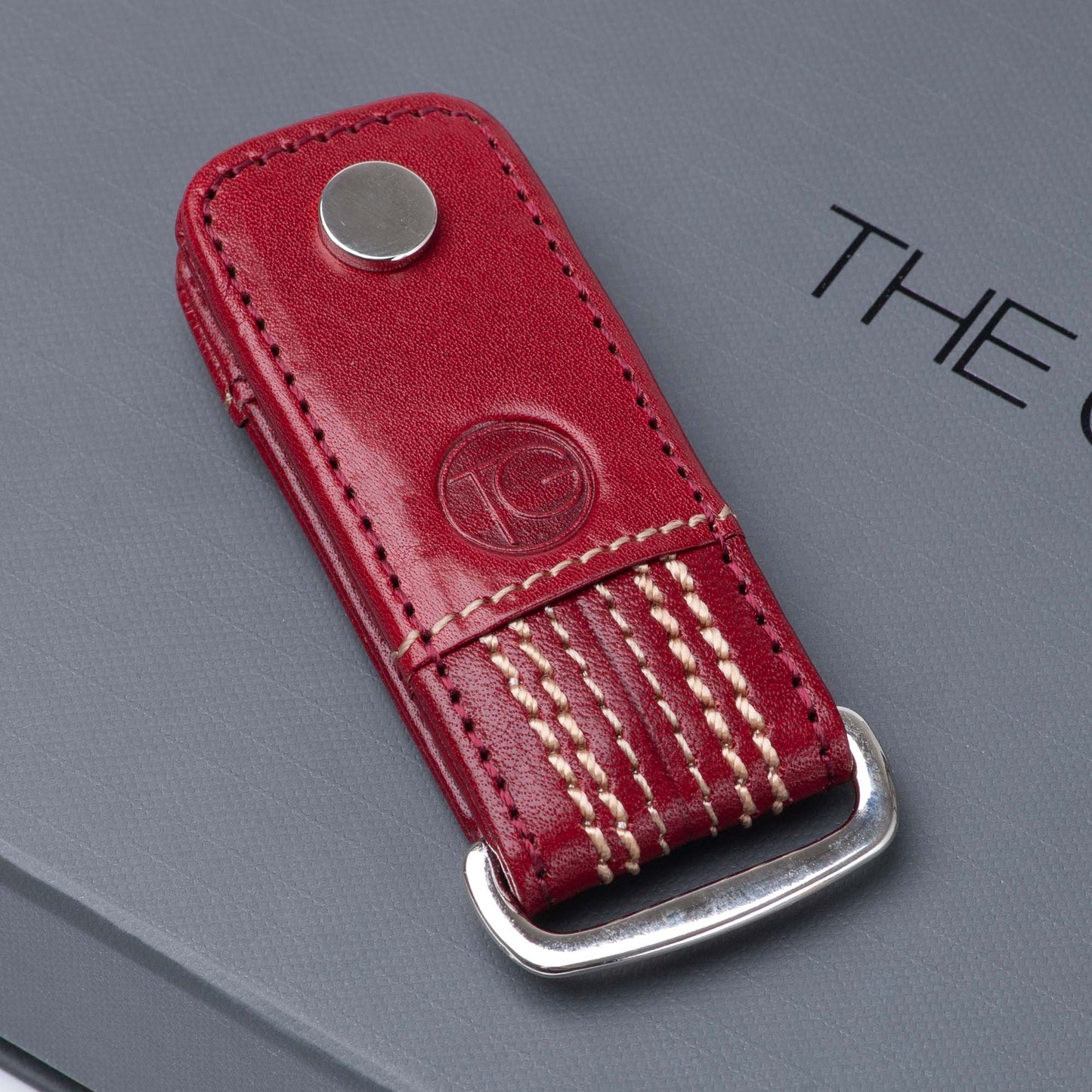 The Game -The Inswinger Keyring -Cherry